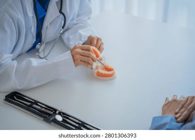 Dentist explaining about the teeth.