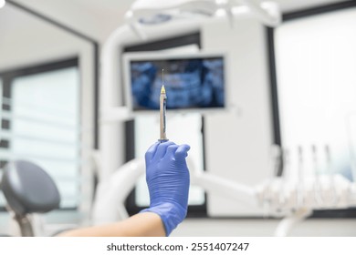 A dentist in gloves holds a syringe during preparation for a dental procedure in a clinical setting. This sterilized equipment is essential for patient care. - Powered by Shutterstock