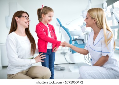 Dentist Greeted Girl And Her Mom At Dentist's Office