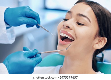 Dentist hands, woman patient and mouth inspection for hygiene with healthcare consultation and metal tools in clinic. Teeth, female person and orthodontist equipment with medical exam for veneers