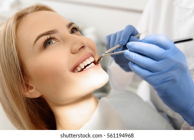 Dentist having view of client teeth