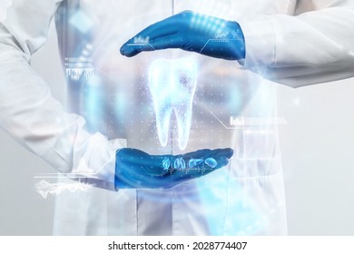 The Dentist Looks At The Hologram Of The Tooth, Checks The Test Result On The Virtual Interface And Analyzes The Data. Concept For Innovative Technologies, Medicine Of The Future, Tooth Snapshot.