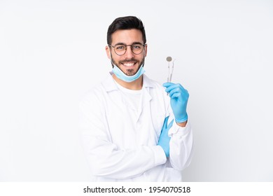 Dentist Man Holding Tools Isolated On White Background Laughing