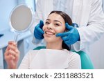 Dentist, mirror and portrait of woman with smile after teeth whitening, service and dental care. Healthcare, dentistry and female patient with orthodontist for oral hygiene, wellness and cleaning