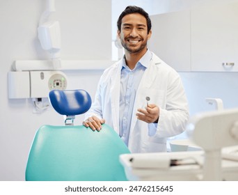 Dentist, portrait and mouth mirror in clinic for consultation, oral hygiene or medical procedure. Service, smile and man doctor with equipment for teeth examination, orthodontics or dental care - Powered by Shutterstock