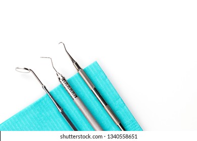 Dentist Professional Tools Medical Equipment Isolated On White Background In Dental Office. Dental Care Conceptual Image Background.