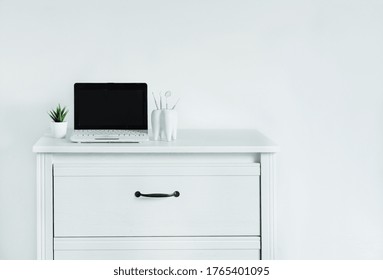 Dentist Table With Laptop And Teeth Model. Computer With Blank Screen On Dentist Table, Template For Design.