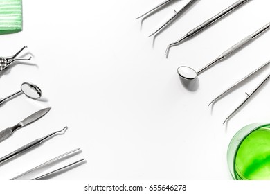 Dentist Tools Close Up On White Hospital Desk Background Top View Mockup