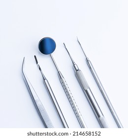 dentist tools mirror tweezers heidemann patel stopfer sonde caries