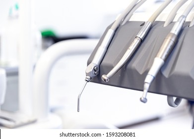Dentist tools in dentist office used by dentist. Dental handpiece and drill