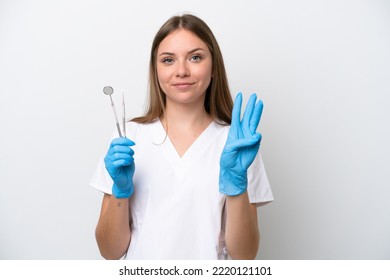 Dentist Woman Holding Tools Isolated On White Background Happy And Counting Three With Fingers