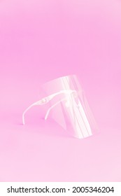 Dentistry Concept. Dental Care Tools For Work. Dentists Use Plastic Mask Glases For Face Protection Isolated On Pink, Gradient Blur Background. Vertical Photo Story Instagram With Copyspace.