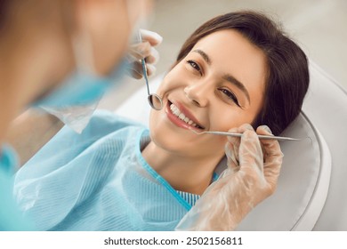 Dentistry, dentist clinic appointment for happy smiling woman, healthy smile, teeth regular checkup. Working with female patient in dentist office using professional tools, health care and medicare 