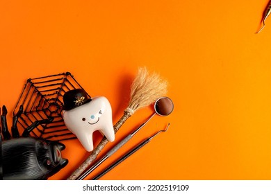 Dentistry.dental.halloween. Holiday Concept. Holidays. Dentist.character For Dentist Halloween Card.dental Concept. Figurines Of Teeth In Halloween Costumes And Dental Instruments. Pumpkins And Broom