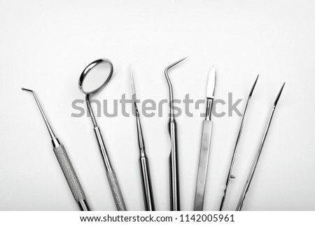 dentists tools on white