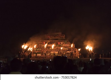 Denton, Texas/United States - November 10, 2017: University Of North Texas Students And Alumni  Watching The Bonfire About To Be Lit With Torches For Homecoming Week