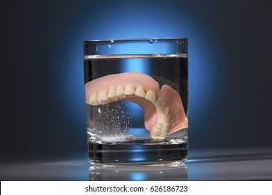 dentures in a teacup