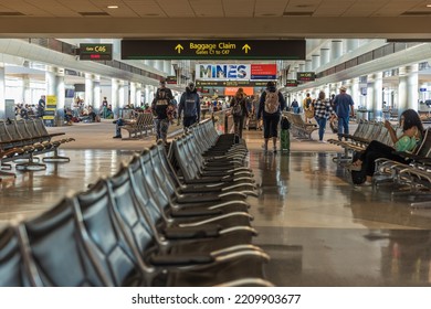 DENVER, CO, AUGUST 28, 2022. Inside The Denver International Airport, Featuring People On The Ground Level At C-Gates.