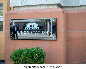 DENVER, CO JULY 16, 2018: Denver Union Station Sign Outside Of Entrance With People Walking In