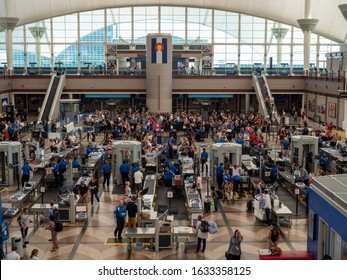 Denver, CO July 7, 2018: Large line of travelers backed up at security checkpoint at Denver International Airport
