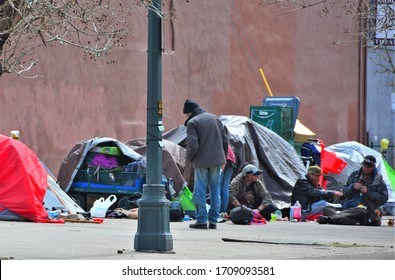 Denver, CO, USA, April 19, 2020. Unidentified Homeless People Camping Out And Living On The Streets In Downtown Denver Because The Homeless Shelters Are No Longer Safe Due To The Coronavirus. 