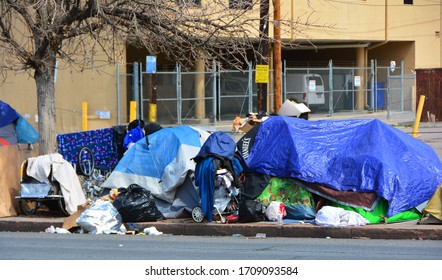 Denver, CO, USA, April 19, 2020. Unidentified Homeless People Camping Out And Living On The Streets In Downtown Denver Because The Homeless Shelters Are No Longer Safe Due To The Coronavirus. 