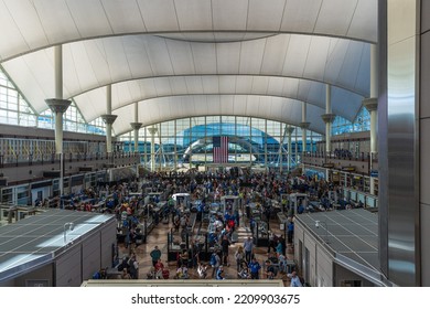 DENVER, CO, USA. AUGUST 28, 2022. Travelers In Long Lines At Denver International Airport Going Thru The Transportation Security Administrations TSA Security Screening Areas To Get To Their Flights.