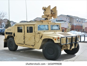 Denver, CO, USA. Feb 22, 2020. 
The High Mobility Multipurpose Wheeled Vehicle  Humvee) Are Four-wheel Drive, Military Trucks And Utility Vehicles. This One In In Desert Brown And Is Used By MP's. 