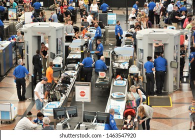 Denver, CO, USA. July 27, 2019. Travelers in long lines at Denver International Airport going thru the Transportation Security Administrations (TSA) security screening areas to get to their flights.