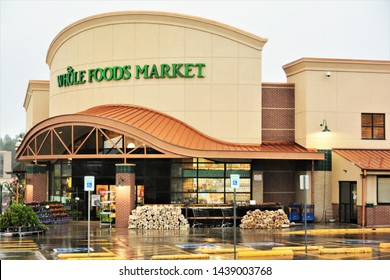 Denver, CO, USA. June 25, 2019. Whole Foods Market Inc. is an American supermarket chain. Whole foods has 500 stores in America. This store is located on Hampden Ave in Denver. 

