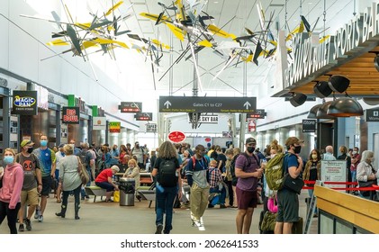 Denver, Colorado - 9-25-2021: People waiting for their flight at Denver Internation airport, colorado, many in line for fast food