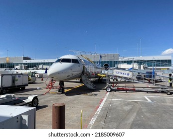 Denver, Colorado - April 14 2022: A United Express Regional Jet On The Tarmac Of Denver Airport