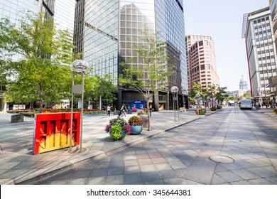 DENVER, COLORADO - AUGUST 25: Views of the main shopping street 16th Street in Denver on August 25, 2015. On this street are free public buses driving and it provides a lot of shopping opportunities. 