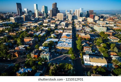 Denver Colorado Downtown Skyline Aerial Drone View Of Long Perspective Streets And Roads In Historic Neighborhood In The Mile High City Of Denver , Colorado