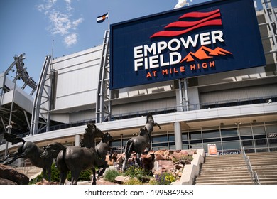 Denver, Colorado - June 9, 2021: Empower Field At Mile High Stadium With Charging Broncos Statues