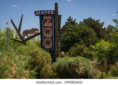 Denver, Colorado - June 9, 2021: Denver Zoo sign with cheetah