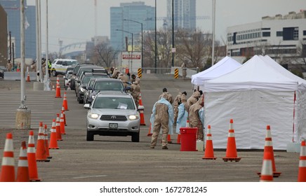 DENVER, COLORADO - MARCH 14, 2020: People Come To The Coronavirus Testing Site At Denver Coliseum