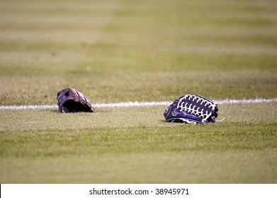 DENVER, COLORADO - OCTOBER 11:  Colorado Rockies Players Gloves Lie On The Infield Prior To Game 3 Of The National League Division Series On October 11, 2009 In Denver Colorado.