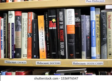 DENVER, COLORADO - OCTOBER 20, 2019: Bookshelf with the books on Holocaust