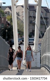 Denver, Colorado - September 7, 2019: Three Young Girls Crossing Highland Bridge In Downtown Denver On A Sunny Afternoon