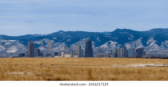 Denver, Colorado Skyline with Rocky Mountains - Powered by Shutterstock