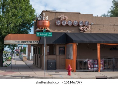 Denver, Colorado / United States Of America - September 7 2019 : The Copper Pot Store Front And Main Entrance, At Street Corner In Daylight.