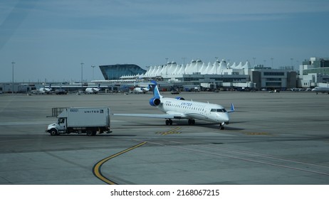 Denver, Colorado, USA - April 2022: A CRJ700 Of United Express At Denver International Airport