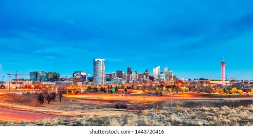  Denver, Colorado, USA downtown city skyline and highways at dawn.