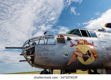 DENVER, COLORADO / USA -  July 27, 2019: A World War II era military airplane performs at the 2019 WarBird Auto Classic, a showcase event at the Colorado Air and Space Port. 