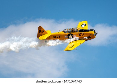 DENVER, COLORADO / USA -  July 27, 2019: A World War II era military airplane performs at the 2019 WarBird Auto Classic, a showcase event at the Colorado Air and Space Port. 