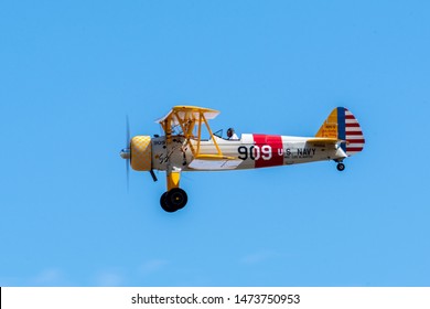 DENVER, COLORADO / USA - July 27, 2019: World War II era military airplanes on display and flying at the 2019 WarBird Auto Classic, a showcase event at the Colorado Air and Space Port.