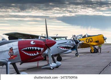 DENVER, COLORADO / USA - July 27, 2019: World War II era military airplanes on display and flying at the 2019 WarBird Auto Classic, a showcase event at the Colorado Air and Space Port.