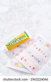 Denver, Colorado, USA-December 29, 2020 - Bandaids And Neosporin To Help With Kids Cuts On The Counter.