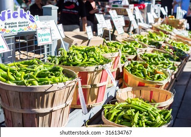 Denver, Colorado, USA-September 9, 2015. Green Chili Peppers In Baskets At The Local Farmers Market.